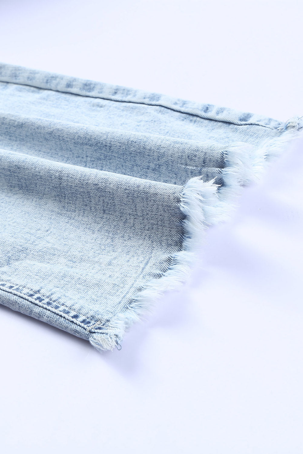 Distressed Frayed Trim Flared Jeans